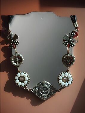 Demdaco White and Silver Floral Medallion Necklace